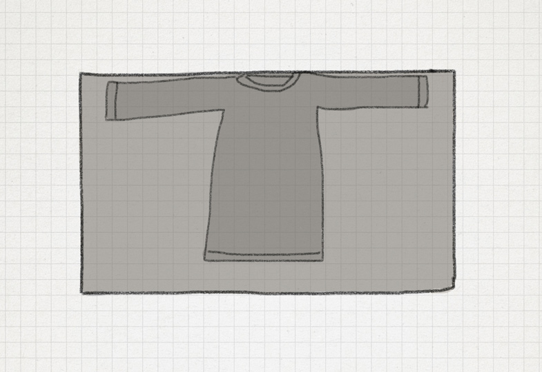 T-Shirt flach auf dem Stoff ausbreiten und Stoff zu einem Rechteck zuschneiden.