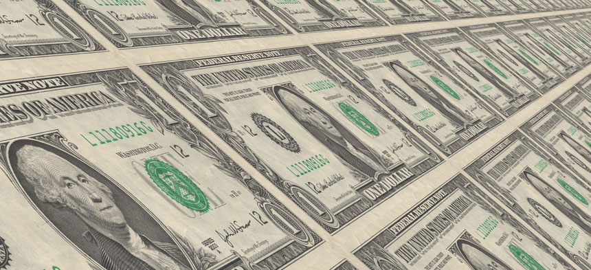 Amerikanische Dollar auf einem Blatt, die noch nicht auseinander geschnitten wurden.