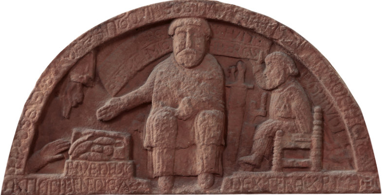 Bogenfeld mit Stifterdarstellung in der Kirche von Larrelt bei Emden aus rotem Mainsandstein.