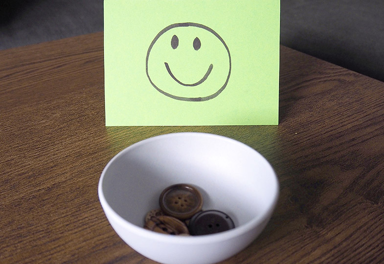 Smiley auf einem Notizzettel