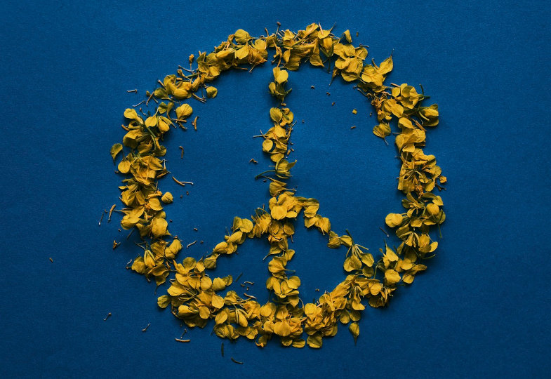 Peace-Zeichen in gelb und blau