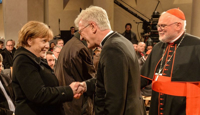 Angela Merkel mit Kardinal Karl Marx und Heinrich Bedford-Strohm