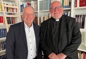 Chefredakteur Stefan Orth und Kardinal Reinhard Marx